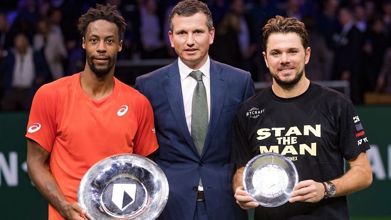 Gael Monfils and Stan Wawrinka with the winner and runner up trophies at Rotterdam-2019
