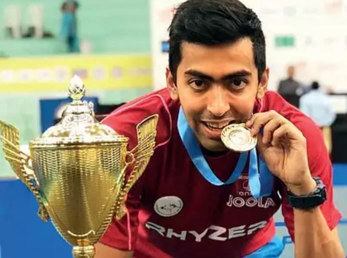 Harmeet with his National Championships title (Courtesy: Ahmedabad Mirror)