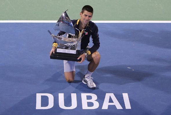 Djokovic celebrates his 4th Dubai title in 2013