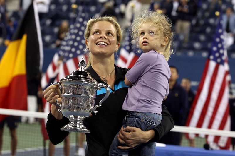 Clijsters with her daughter after winning the US Open in 2010