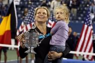 Clijsters with her daughter after winning the US Open in 2010