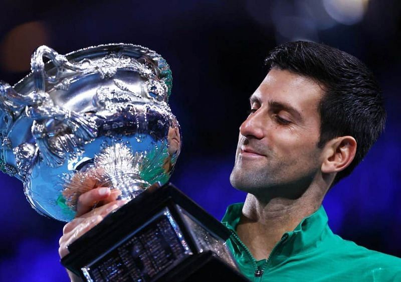 Djokovic hoists aloft a record-extending 8th Australian Open title