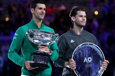 Dominic Thiem (right) falls short in his first Australian Open final