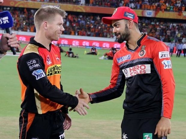 David Warner with Virat Kohli