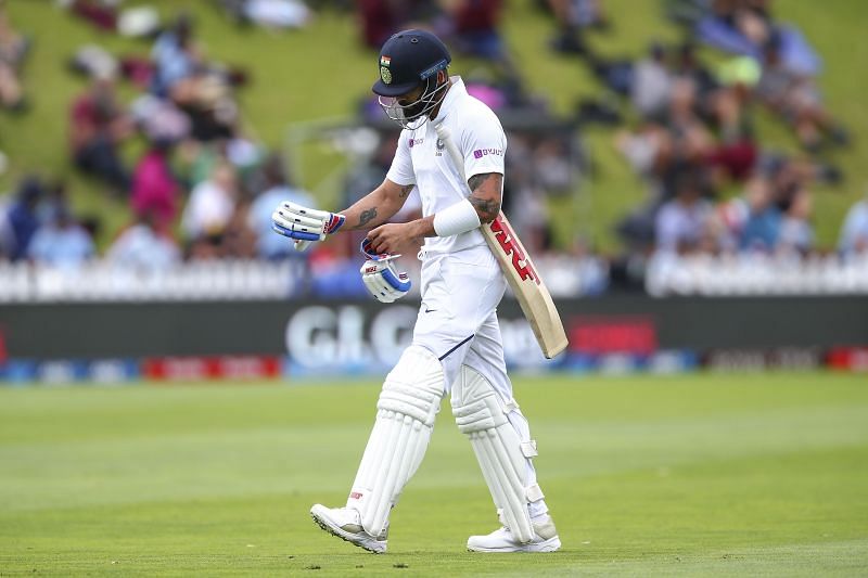 Virat Kohli walks back to the pavilion crestfallen