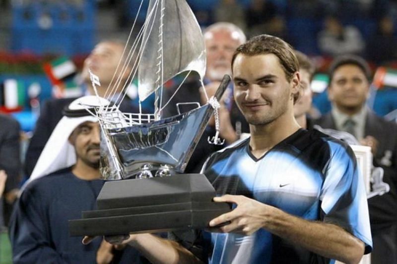 Federer hoists aloft his first Dubai title in 2003