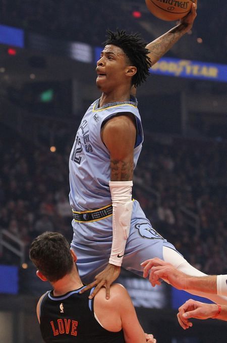 Ja Morant dunks over Kevin Love