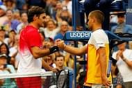 Federer (right) beat Youzhny for the 17th time at the 2017 US Open