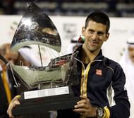 Djokovic lifts his 4th Dubai title in 2013 Djokovic celebrates his 5th Dubai title