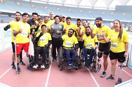 Event ambassador Sachin Tendulkar poses with the participants