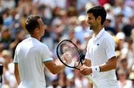 Philipp Kohlschreiber(L) and Novak Djokovic