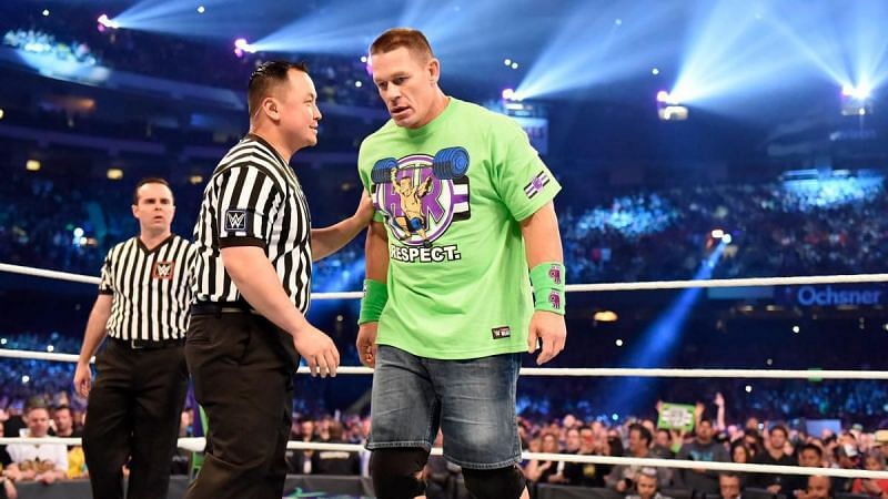 John Cena having a word with the referee