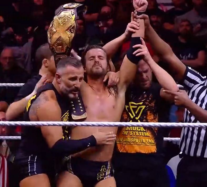 Adam Cole retains the title with slight assistance from Johnny Gargano