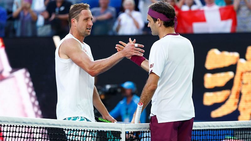 Federer (right) saved 7 match points against Tennys Sandren in the Australian Open quarterfinals