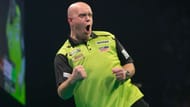 Michael van Gerwen celebrates a 7-1 win in the Premier League.