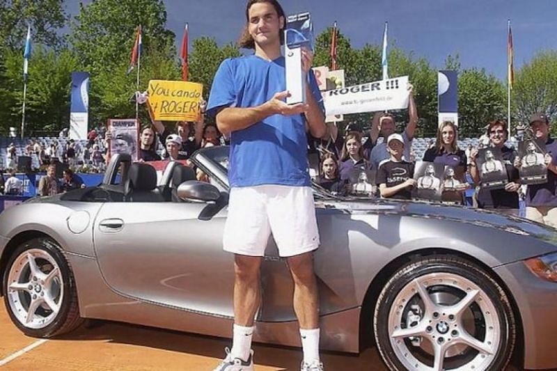 Federer poses with his Munich title in 2003