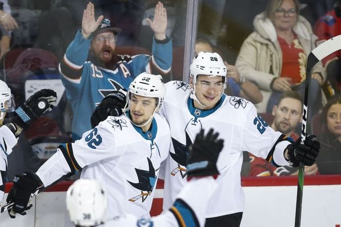 Thornton reaches 1,500 points, Sharks beat Flames 3-1