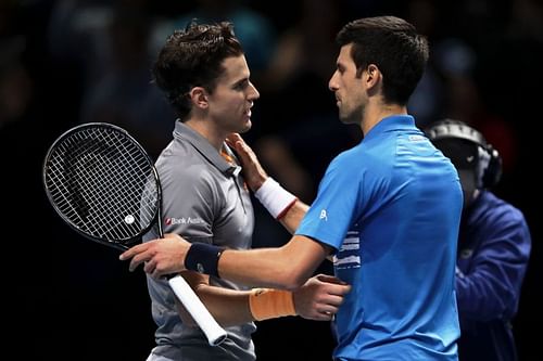 Dominic Thiem (L) and Novak Djokovic