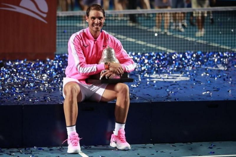 Rafael Nadal sits on the 2020 Acapulco winners&#039; podium