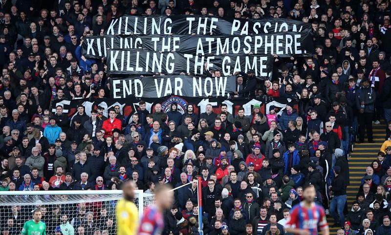 Fans protesting against VAR use in a game between Crystal Palace and Arsenal