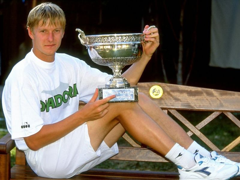 Yevgeny Kafelnikov poses with his second Grand Slam title at the 1999 Australian Open.&nbsp;