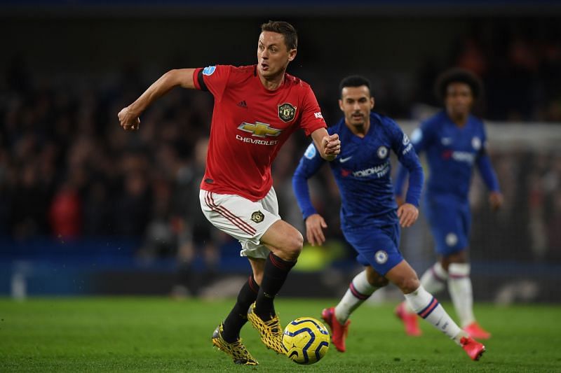 Nemanja Matic with the ball for Manchester United against his former club Chelsea at Stamford Bridge .