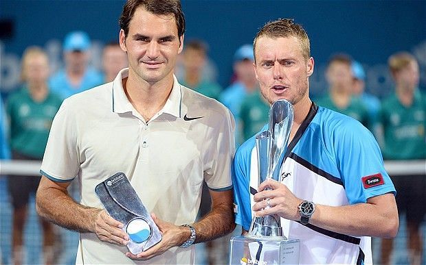 Federer lost to Hewitt (right) in the 2014 Brisbane final.