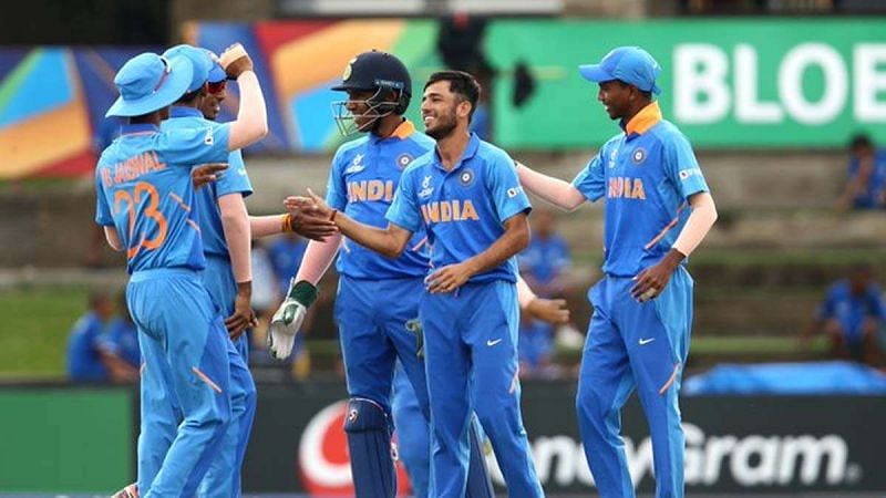 Ravi Bishnoi celebrates a wicket with his teammates at the U-19 World Cup 2020