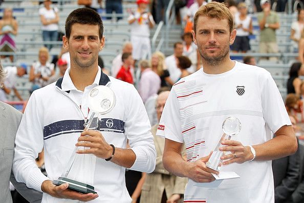 In his 4th Masters final, Mardy Fish (right) fell to Djokovic at the 2011 Coupe Rogers.
