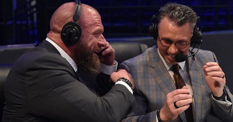 Triple H and Michael Cole.