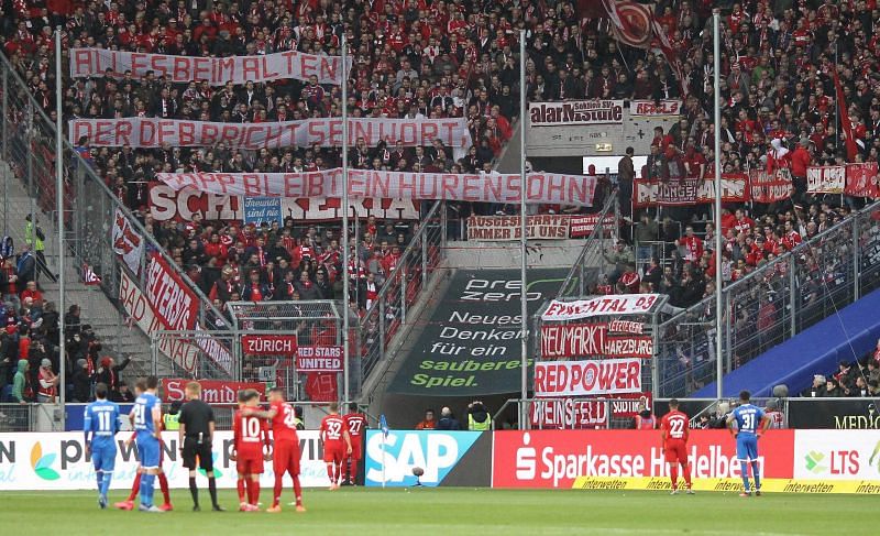 Offensive banners directed at Dietmar Hopp by Bayern fans