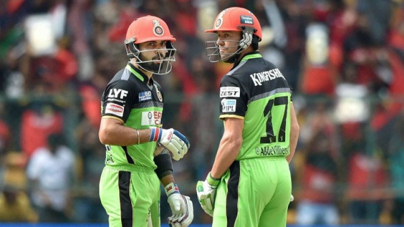 Virat Kohli and AB de Villiers sporting the green RCB jersey