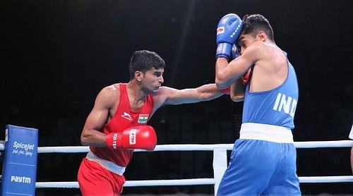 Manish Kaushik (in red) became the 9th Indian boxer to qualify for the Tokyo Olympics