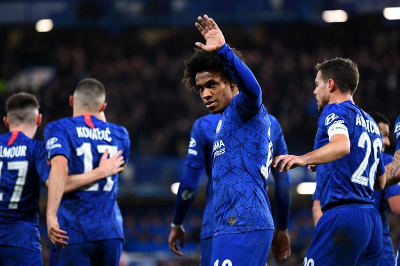 Willian celebrates his opener as Chelsea were victorious over Liverpool to book their FA Cup QF place