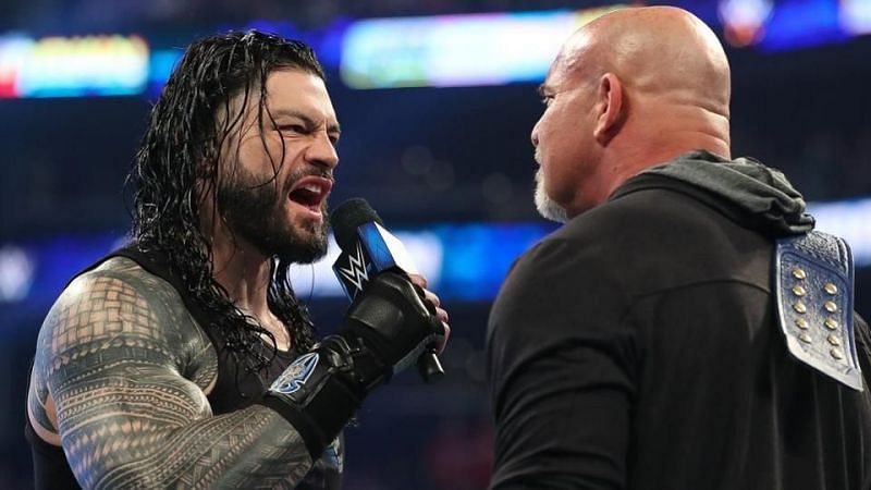 Roman Reigns confronting Goldberg