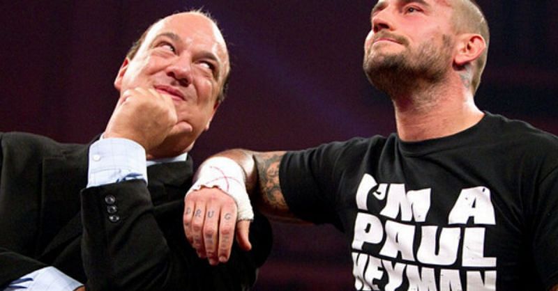 Paul Heyman and CM Punk.