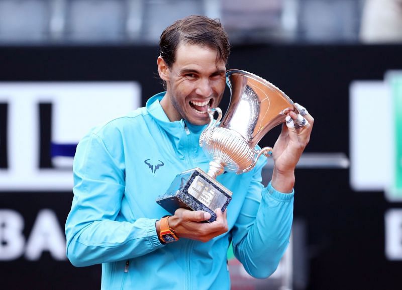 Nadal poses with his 9th Rome Masters title in 2019.