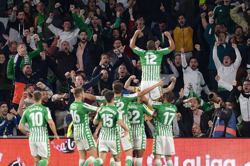 Real Betis players celebrate Sidnei&#039;s brilliant opener during their memorable 2-1 win over Real Madrid