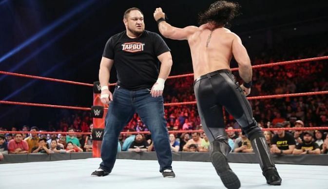 Samoa Joe in action against Seth Rollins.