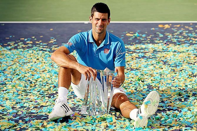 Djokovic poses with his 5th Indian Wells title in 2016.