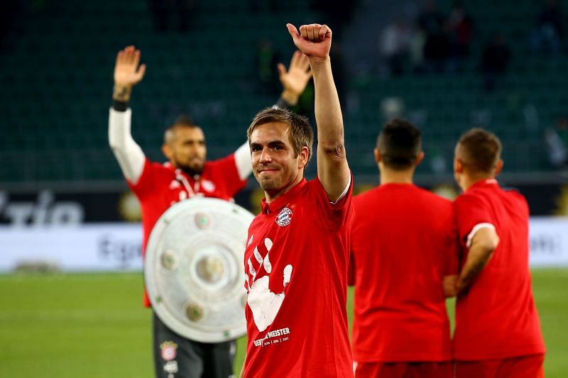 Lahm salutes supporters during yet another Bundesliga triumph
