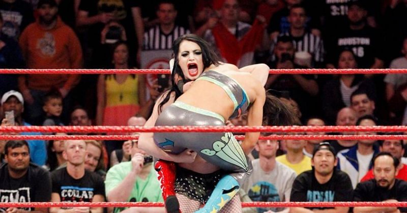Paige delivering The RamPaige on Bayley.
