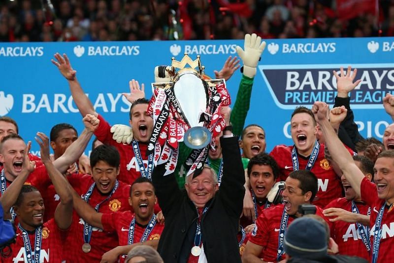 Sir Alex Ferguson lifts the Premier League title for the final time in his career in 2012-13.