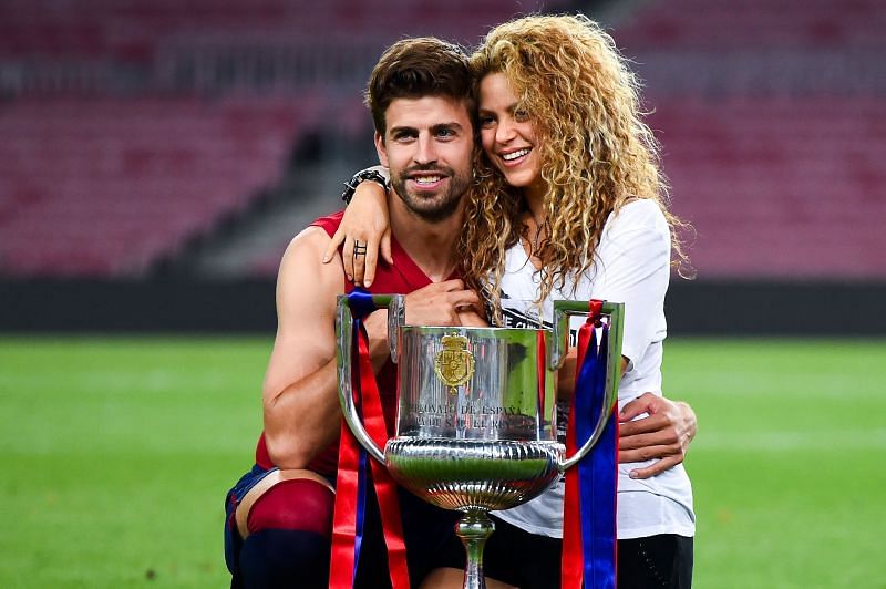Gerard Pique and Shakira strike a pose with the Copa del Rey title