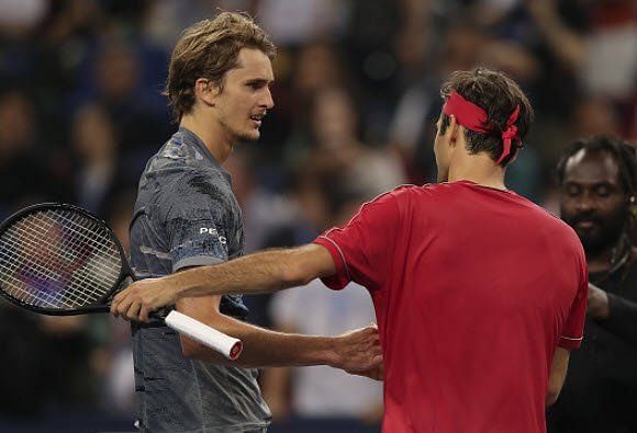 Federer greets Zverev following his defeat to the young German in the 2019 Shanghai Masters.