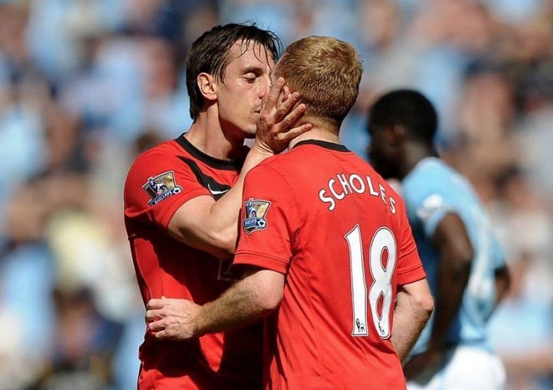 Gary Neville planted a kiss on Paul Scholes who scored a late winner against City at the Etihad in 2009