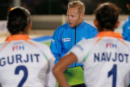 Indian Women's Hockey Team Chief Coach Sjoerd Marijne speaks to the players ahead of a match