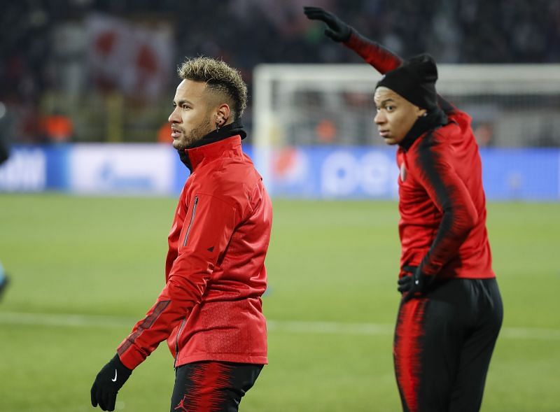 Neymar and Mbappe warming up