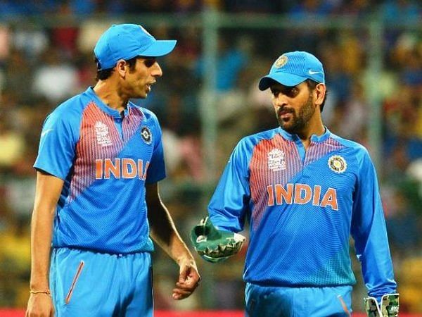 Ashish Nehra (L) and MS Dhoni pictured during the World T20 [PC: Twitter]