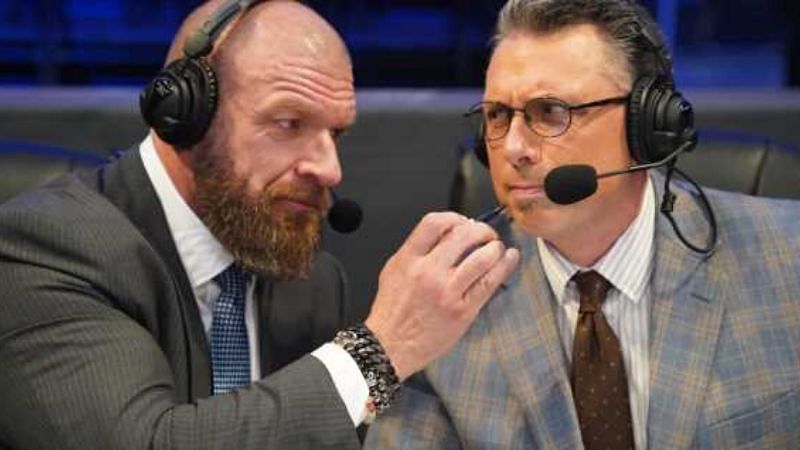Triple H and Michael Cole